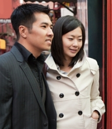 Asian couple in street